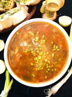 A picture of Classic Vegetable Soup With Pesto Cheese Baguette.