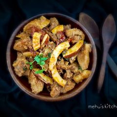 A picture of Nariyal Gosht.