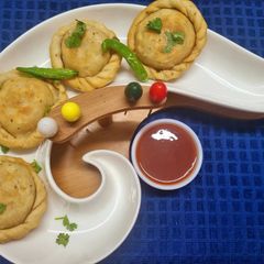 A picture of Chicken Keema and Vegetables Kachori.