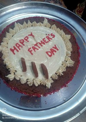 A picture of Oreo cake with butter cream icing.