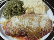 A picture of cheesy chicken parmesan
