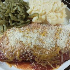 A picture of Cheesy Parmesan Chicken (fried).