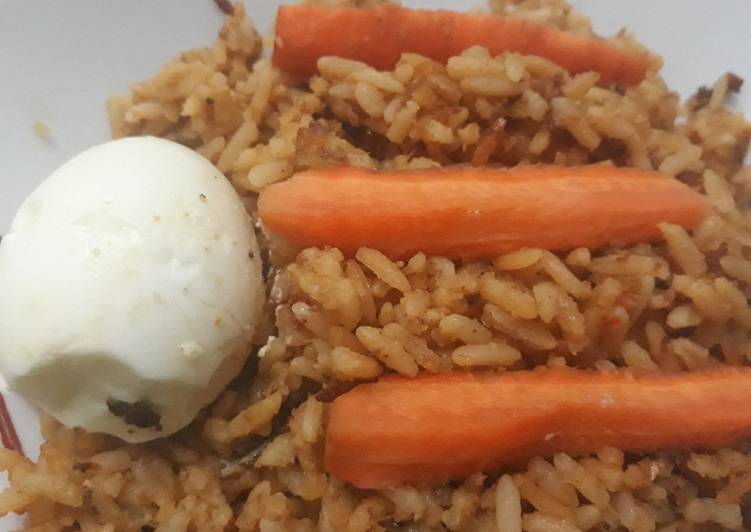 Jollof rice with carrots and egg