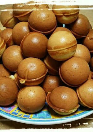 A picture of Baby Castella Using a Takoyaki Maker.
