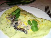 Una foto de crepes pollo champignones