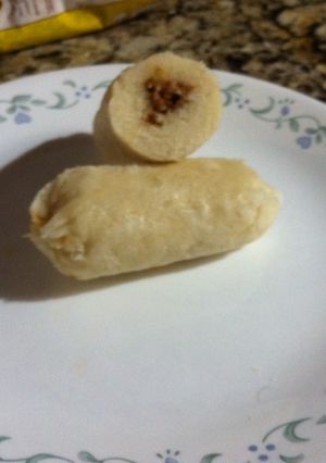 Una foto de Bollo relleno de carne molida