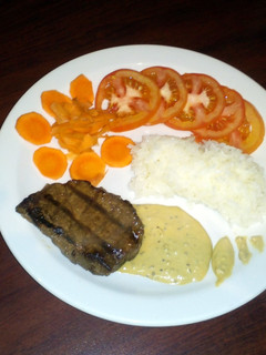 A picture of Eye beef with special mustard sauce.