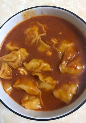 A picture of Boiled Dumplings with Spicy Sauce (2 Versions: With or Without Korean Chili Paste).