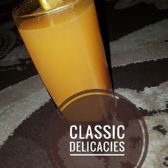 A picture of Orange and carrot juice.