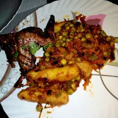 Matoke peas with panfried roast chicken.#authors marathon A picture of Matoke peas with panfried roast chicken.#authors marathon.