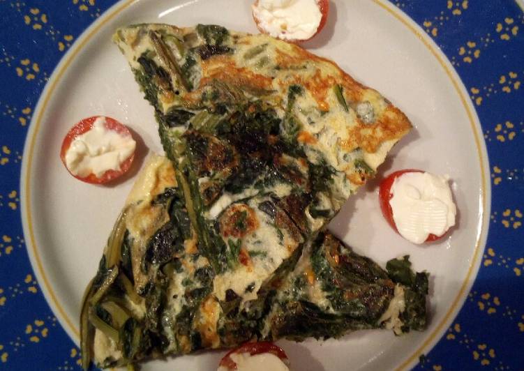 Frittata di borragine e giri con decorazioni pomodorini e Philad