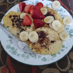 A picture of Chocolate Chip Pancakes With Fruit.