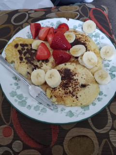 A picture of Chocolate Chip Pancakes With Fruit.