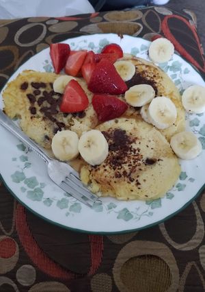 A picture of Chocolate Chip Pancakes With Fruit.