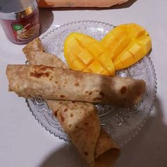 Plain paratha with mango A picture of Plain paratha with mango.