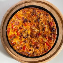A picture of Red Onion, Red Pepper & Red Leicester, etc. Frittata.