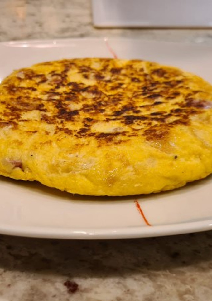Una foto de Tortipan de salchichas y queso