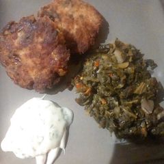 A picture of Fried Fresh Salmon w/kale & dandelion greens.