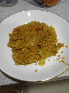 Una foto de Quinoa con zanahoria y cebolla