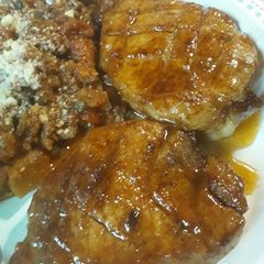 A picture of Rubbed Porkloin Chops in a Sauce.