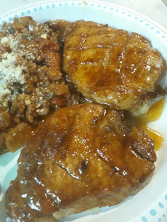 A picture of Rubbed Porkloin Chops in a Sauce.