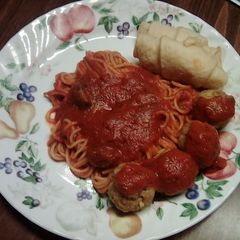 A picture of Homemade spaghetti and meatballs.