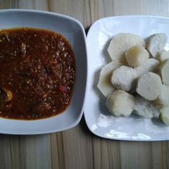 Boiled cocoyam and Aubergine sauce A picture of Boiled cocoyam and Aubergine sauce.