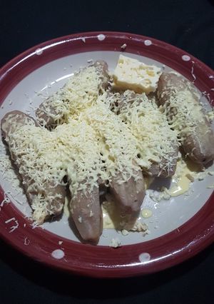 Una foto de Topocho cocido con mantequilla y queso