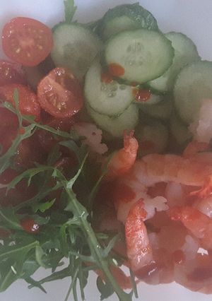 Une photo de Crevettes tigrées en salade