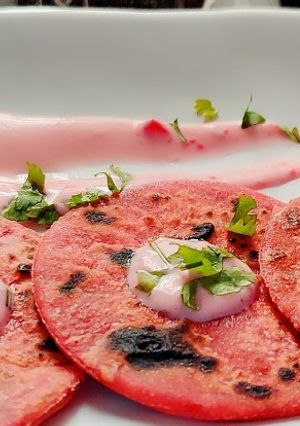 A picture of Beetroot chapati with beetroot dip.