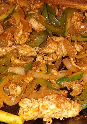 A picture of My green pepper & courgette chicken fajitas.