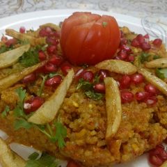 A picture of Tomato tangy rice.