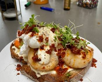 New Recipe Scallops nduja  poached duck eggs on sourdough with a mustard creme fraiche Practical Delicious