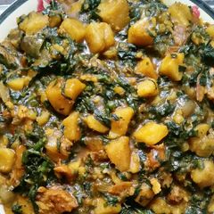 A picture of Porridge Yam and Ugu Leaf.