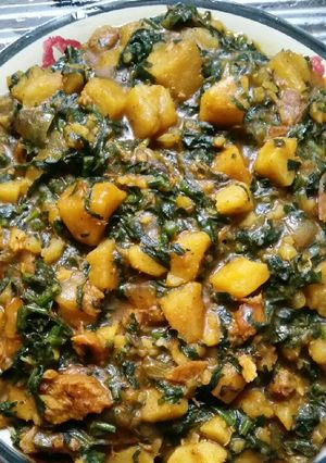 A picture of Porridge Yam and Ugu Leaf.