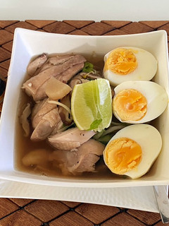 A picture of Noodle Egg With Shiitakes Soup.