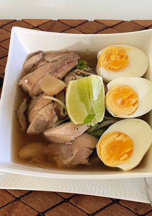 A picture of Noodle Egg With Shiitakes Soup.
