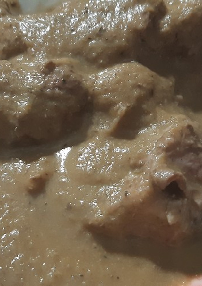 Una foto de Conejo guisado al vino, en olla rápida