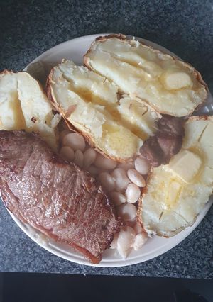 A picture of Sirloin Beef steak Jackets an Butter Beans.