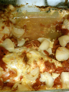 A picture of Baked Chicken and baby potatoes.