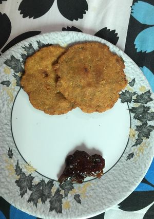 A picture of Aloo Puri with nimboo achar.