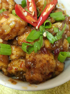 A picture of Chicken in schezwan & black pepper sauce.