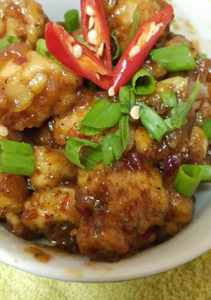 A picture of Chicken in schezwan & black pepper sauce.