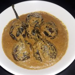 A picture of Eggplant with Salan gravy.