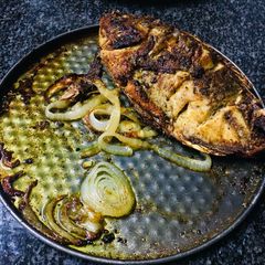 A picture of Baked River Fish (Tilapia spp).