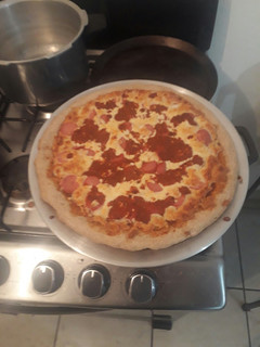 Una foto de Pizza de harina integral