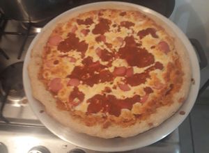 Una foto de Pizza de harina integral