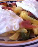 Patatas a lo pobre con jamón y pimientos del padrón