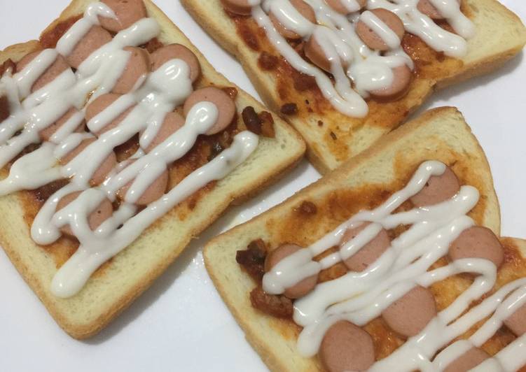 Resep masakan Roti Tawar Topping Sosis Ala Pizza | Bahan Membuat Roti Tawar Topping Sosis Ala Pizza Yang Menggugah Selera