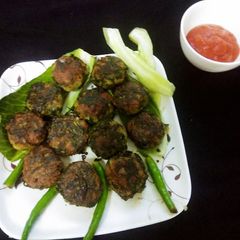 A picture of Chicken Spinach kebabs.